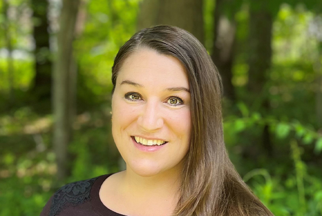 Rachael Bauman-Echlin, project manager in wooded background